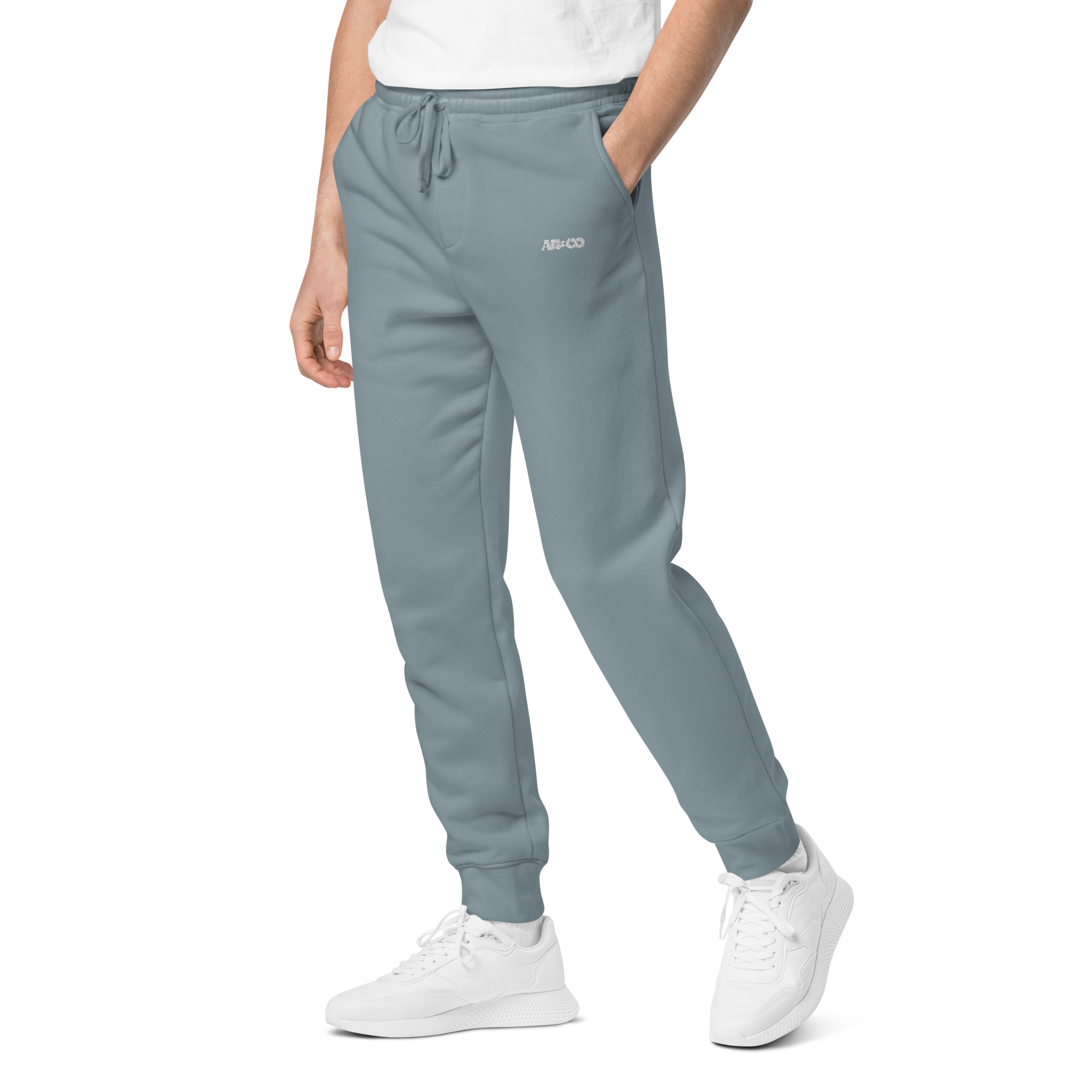 Pigment-dyed relaxed fit sweatpants in Slate Blue with elastic waistband and cuffs, designed for streetwear and everyday comfort.