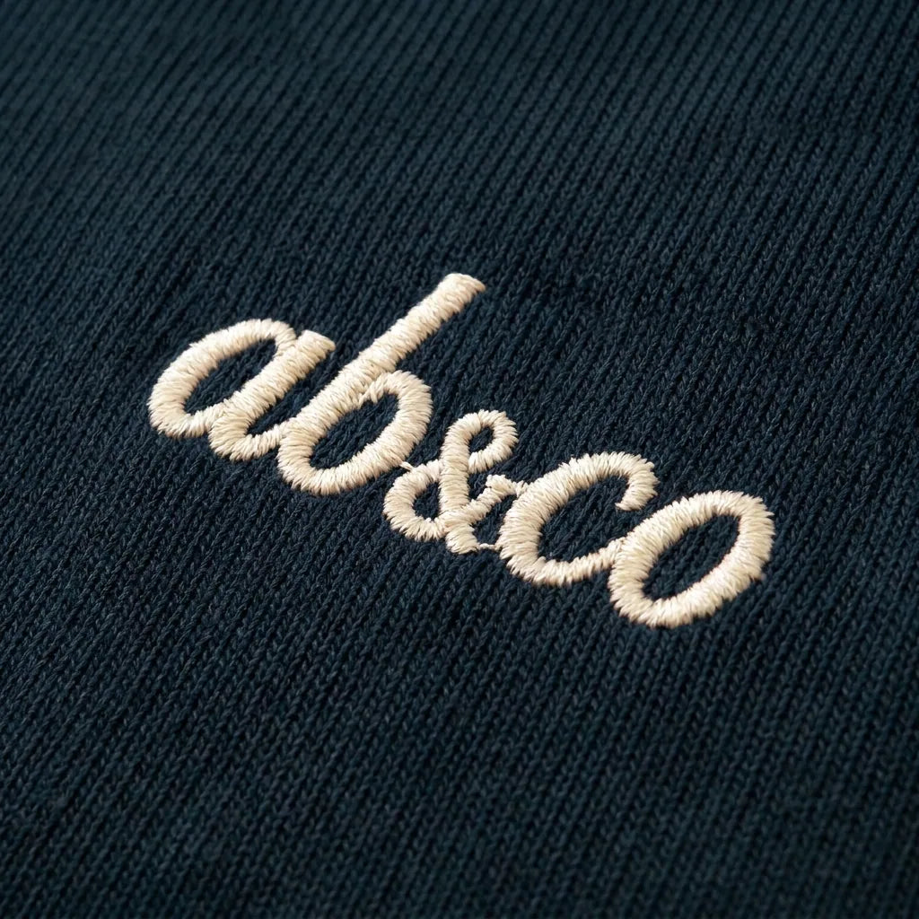 ab&co chest embroidery, peacock teal polo