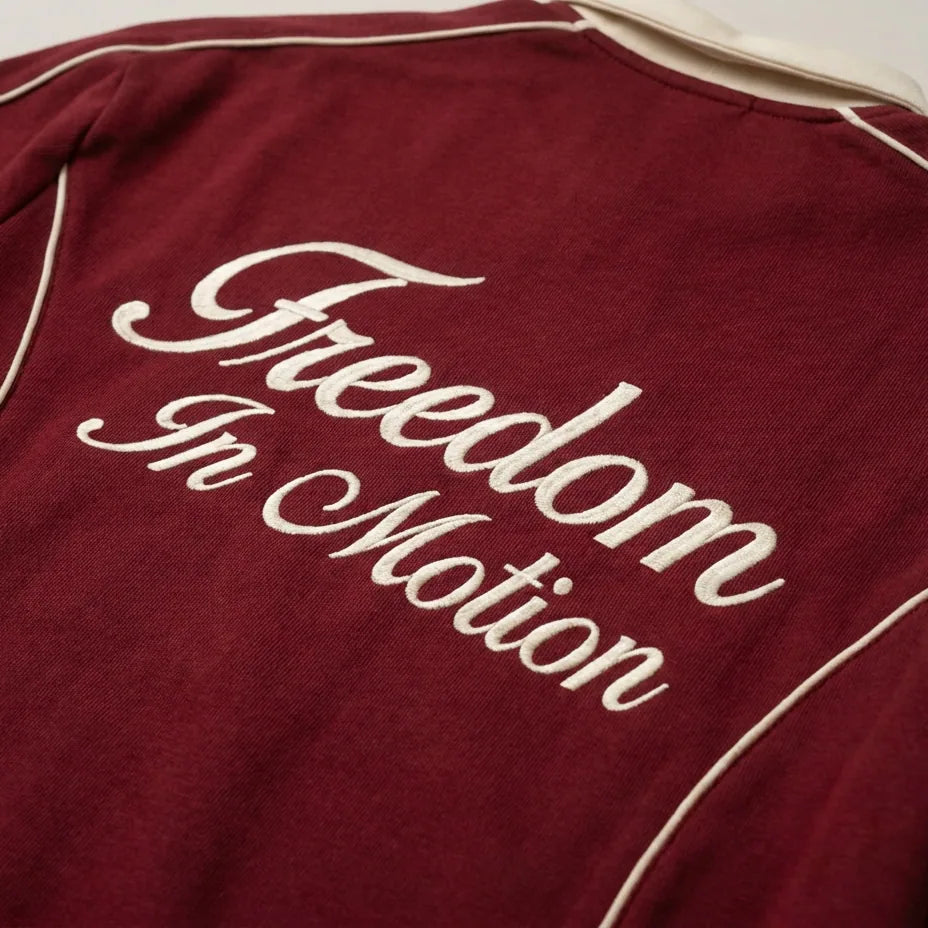 'Freedom In Motion' back embroidery, pomegranate red polo