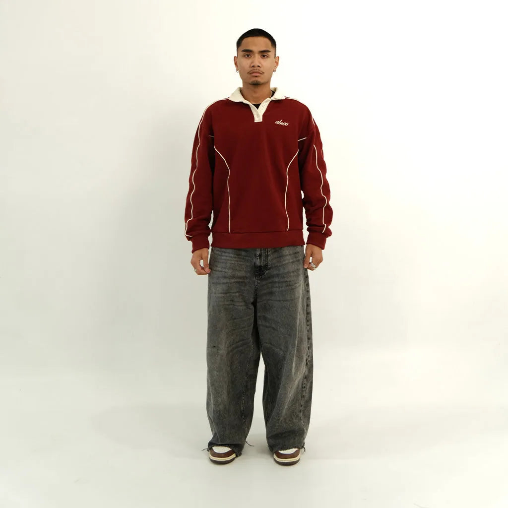 Male model in pomegranate red After Hours polo, front