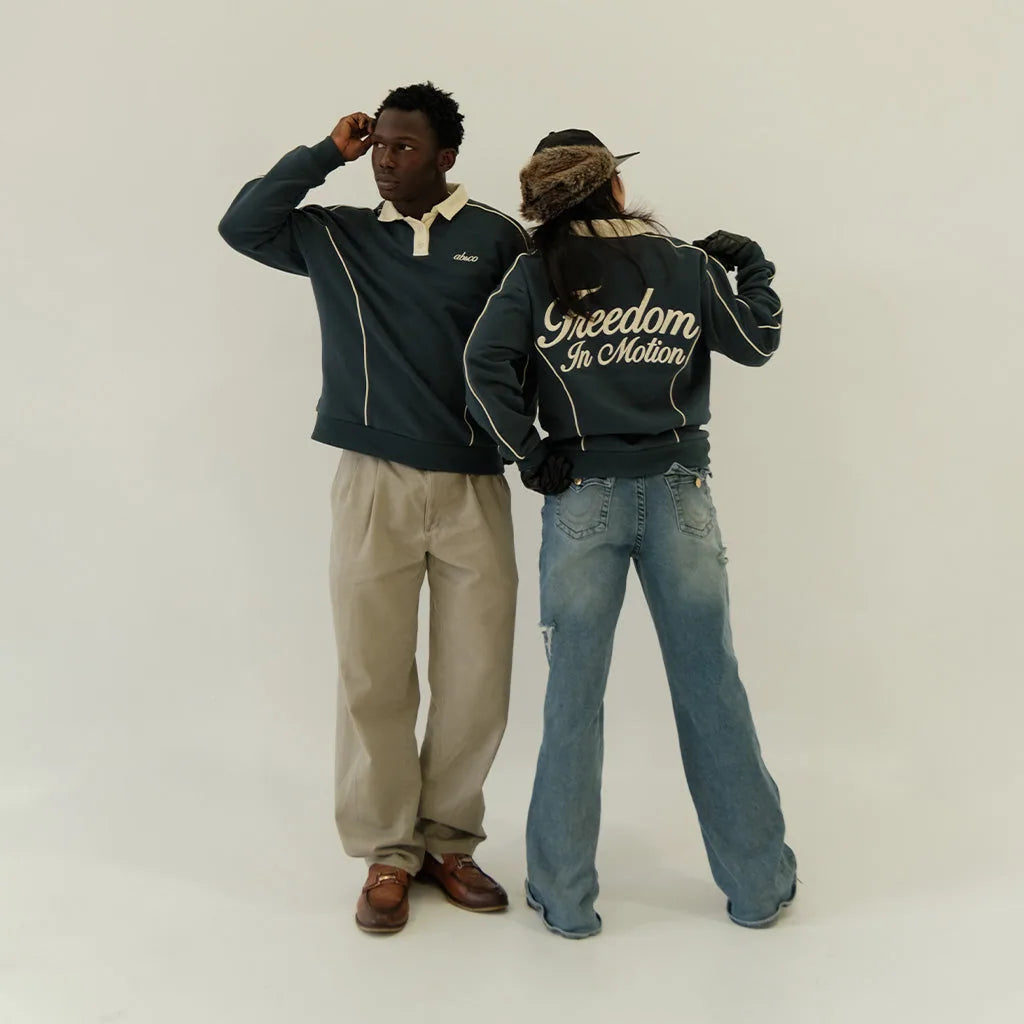 Models in the peacock teal After Hours polo, front and back