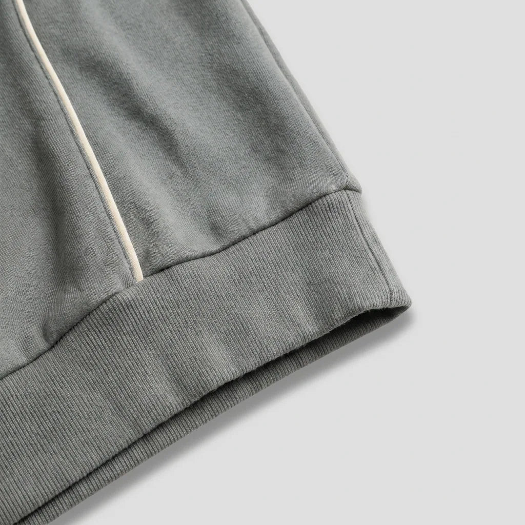Ribbed hem and cream piping, slate grey polo