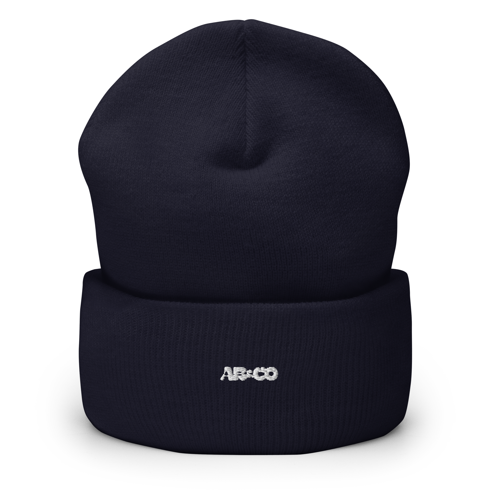 Cuffed knit beanie in Navy with embroidered logo, soft ribbed texture, designed for warmth and everyday streetwear.