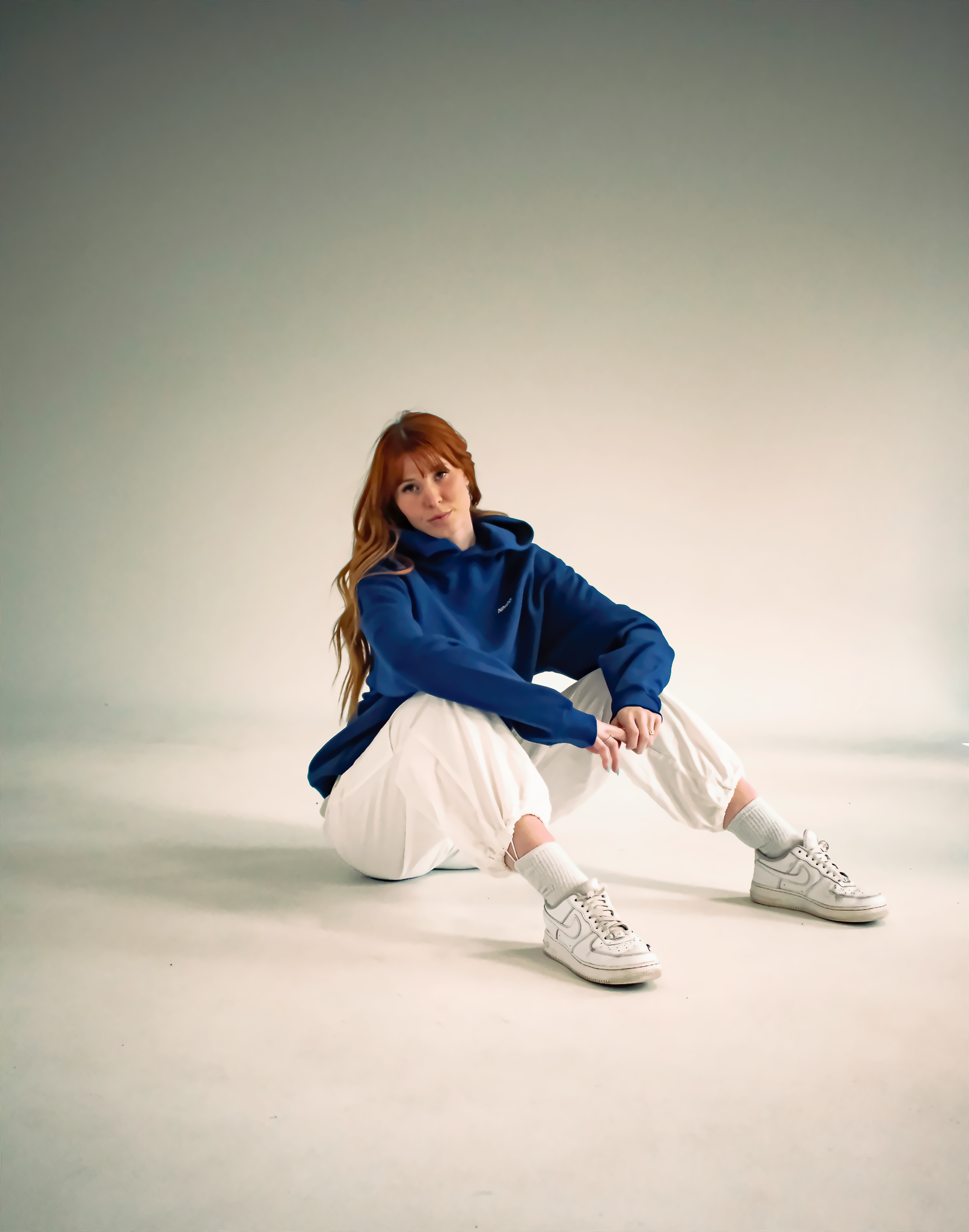 Heavyweight oversized hoodie in Admiral Blue with dropped shoulders, double-layer hood, and ribbed cuffs, designed for streetwear and everyday comfort