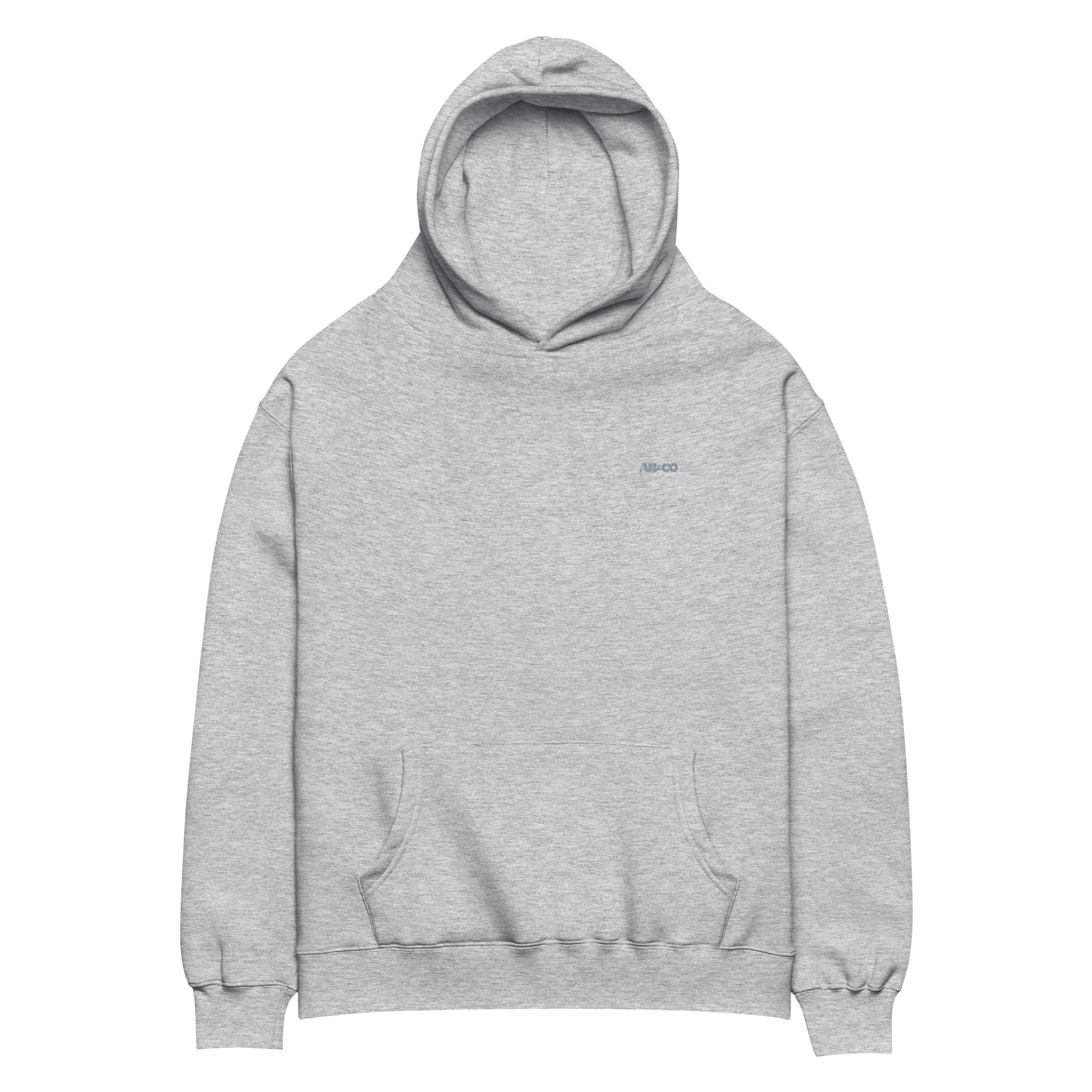 Heavyweight oversized hoodie in Grey with dropped shoulders, double-layer hood, and ribbed cuffs, designed for streetwear and everyday comfort.