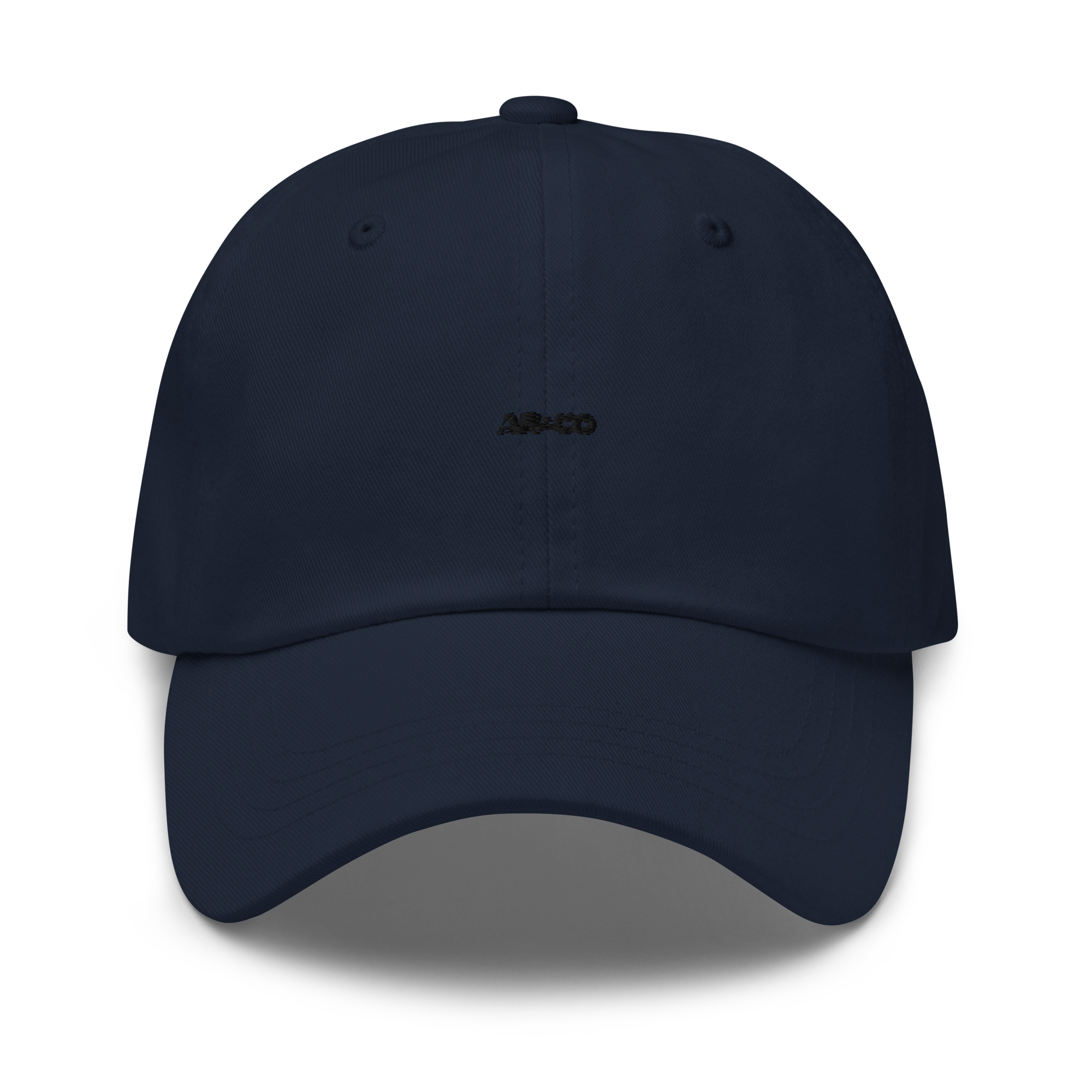 Organic cotton dad hat in navy with embroidered logo, curved brim, and adjustable strap for a relaxed streetwear fit