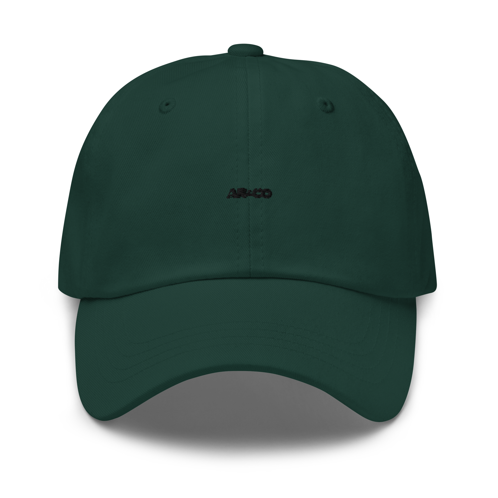 Organic cotton dad hat in Spruce with embroidered logo, curved brim, and adjustable strap for a relaxed streetwear fit.