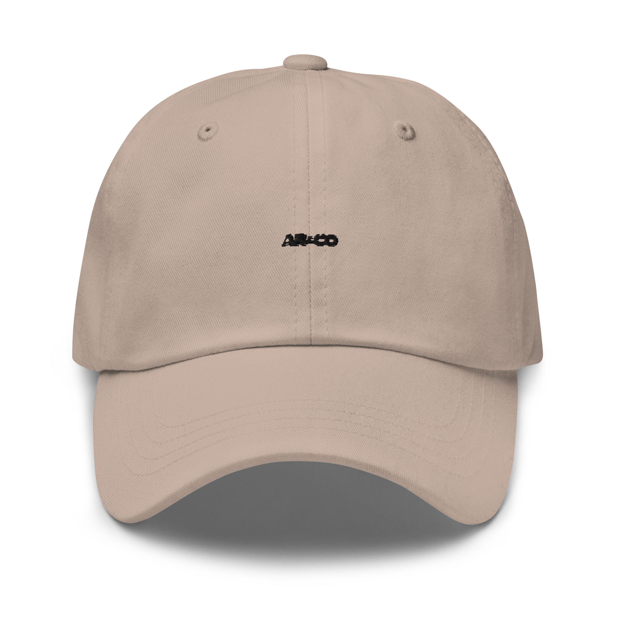 Organic cotton dad hat in Stone with embroidered logo, curved brim, and adjustable strap for a relaxed streetwear fit.