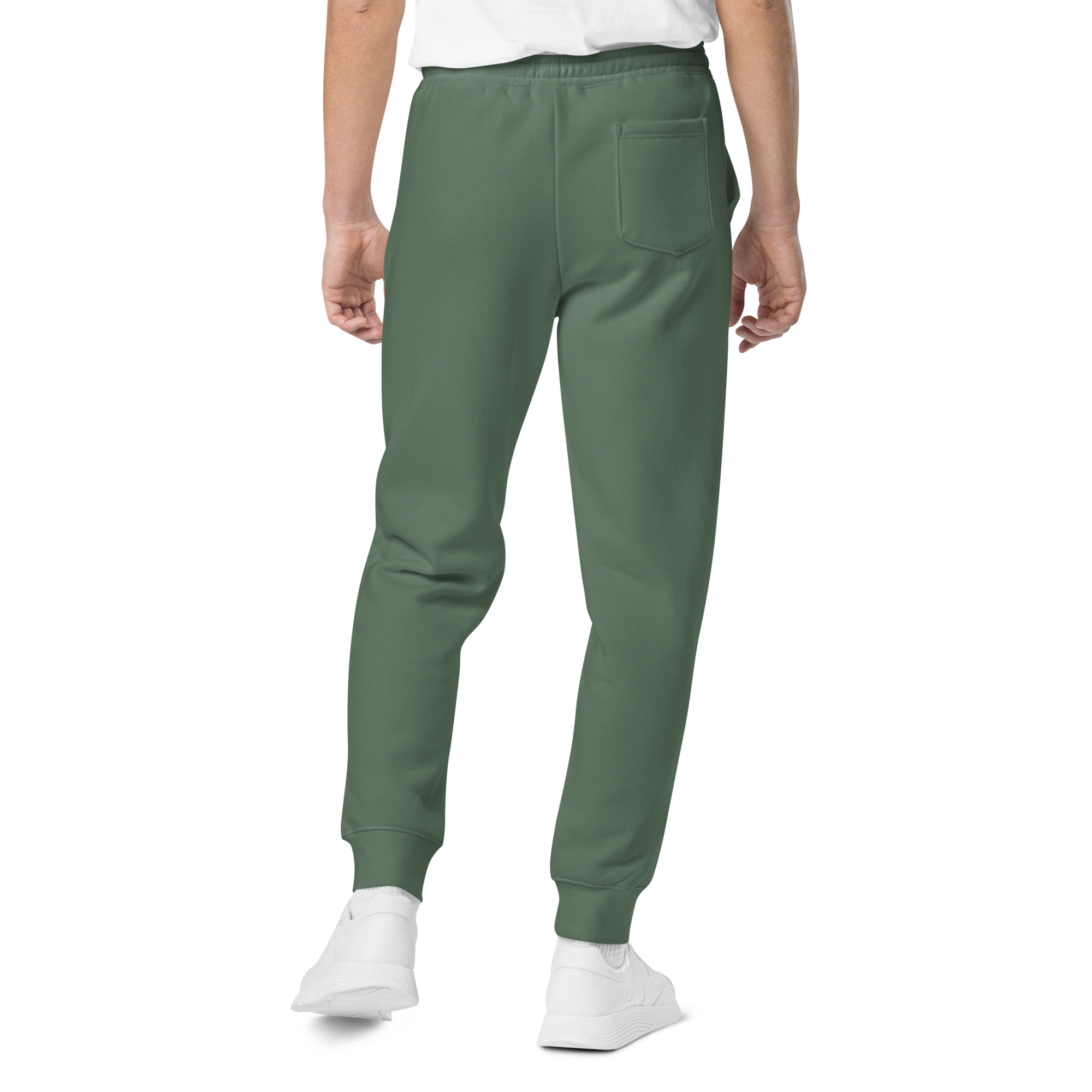 Pigment-dyed relaxed fit sweatpants in Alpine Green with elastic waistband and cuffs, designed for streetwear and everyday comfort.
