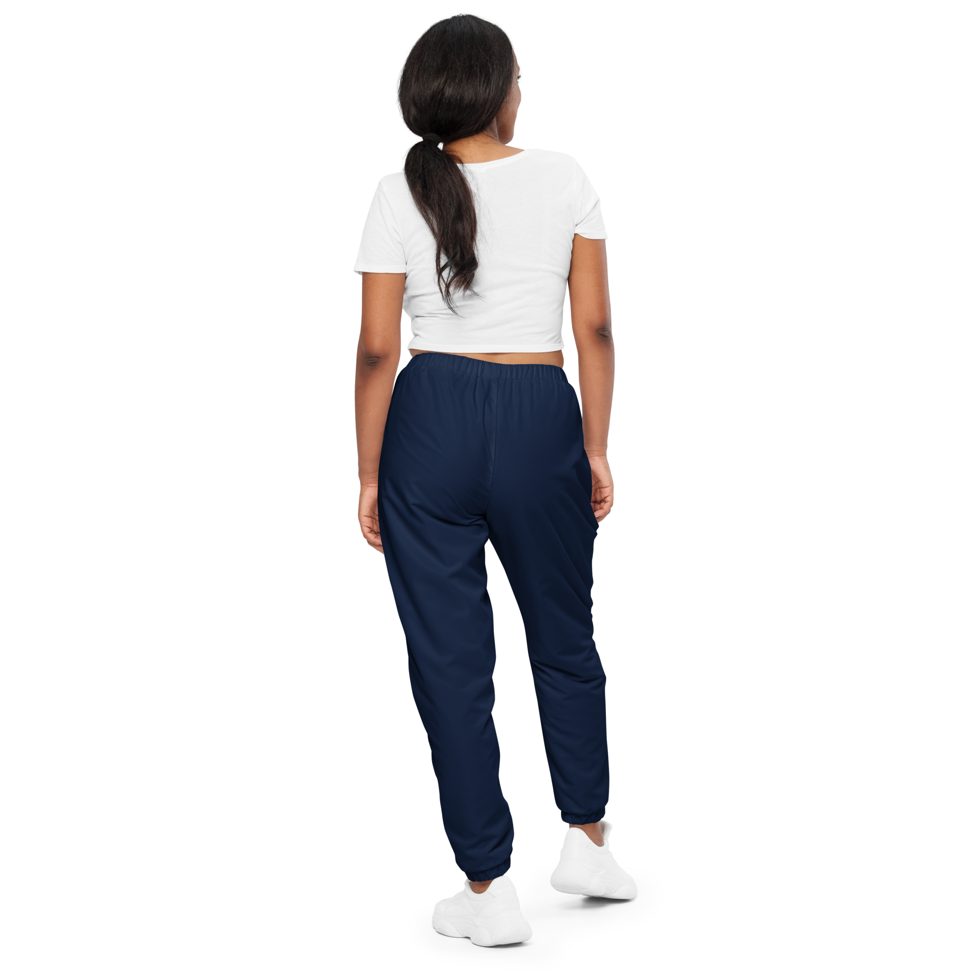 Unisex track pants in Navy Blue with elastic waistband, tapered leg, and side pockets. Relaxed streetwear style for everyday wear.
