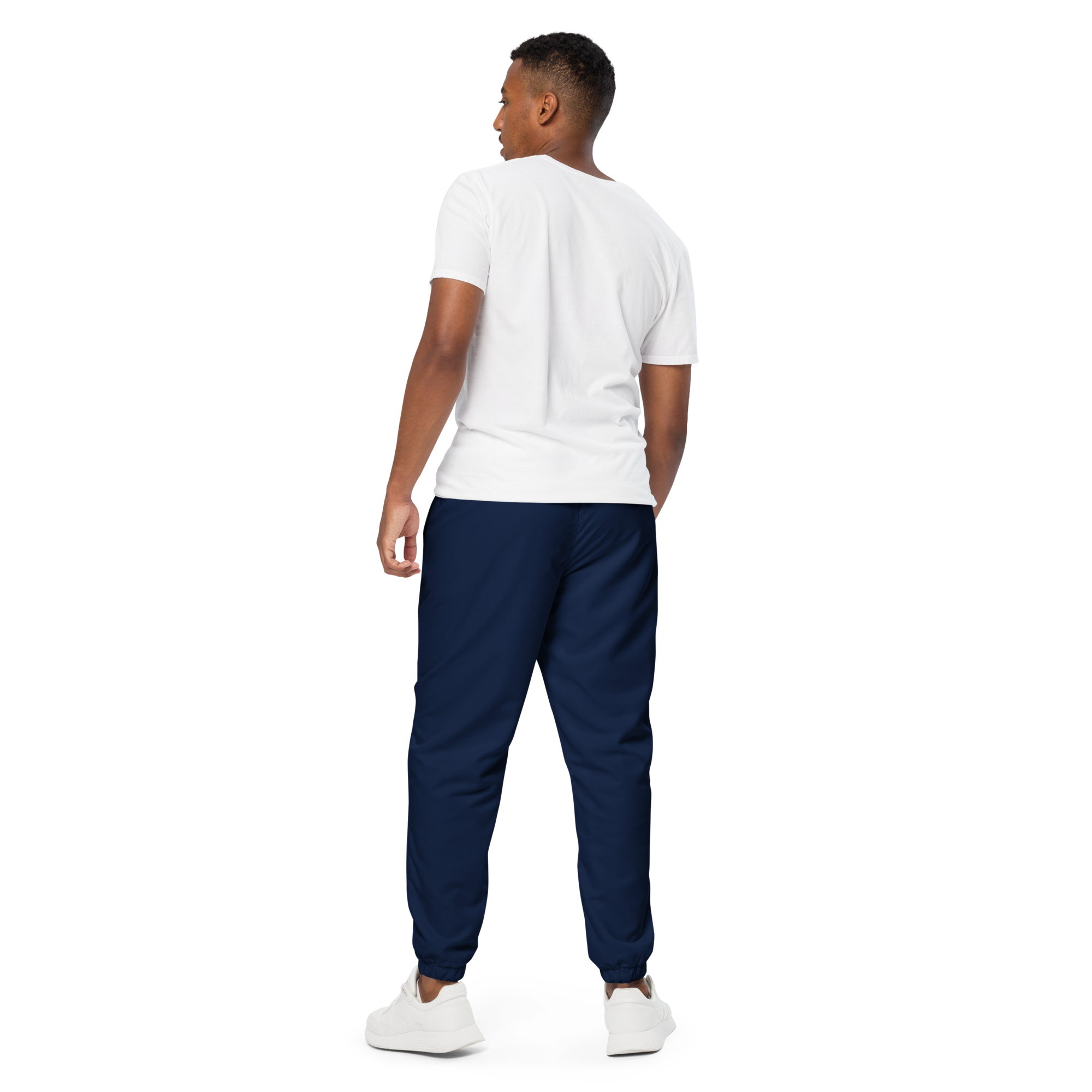 Unisex track pants in Navy Blue with elastic waistband, tapered leg, and side pockets. Relaxed streetwear style for everyday wear.