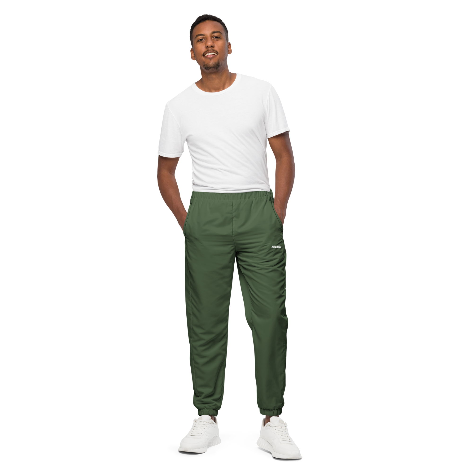 Unisex track pants in Olive with elastic waistband, tapered leg, and side pockets. Designed for casual streetwear and comfort.