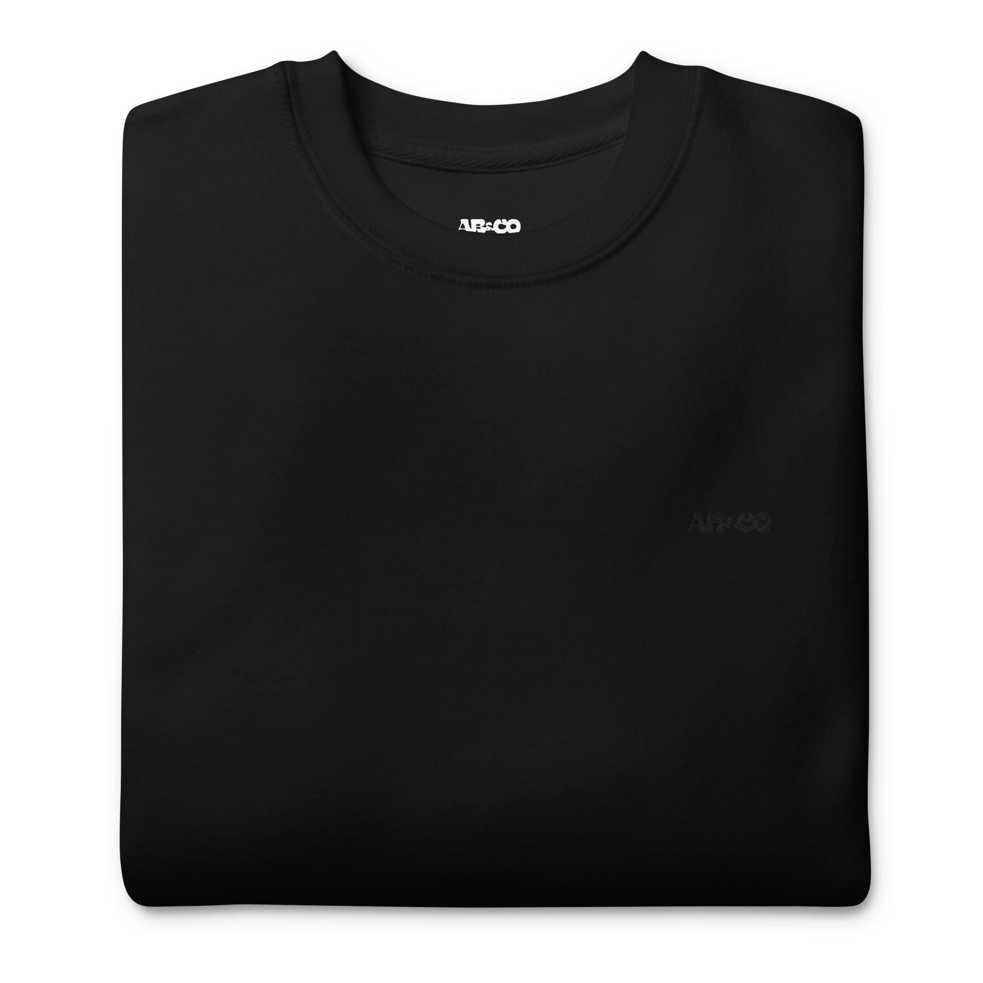 Black embroidered hoodie with soft interior, structured fit, and minimal streetwear design.