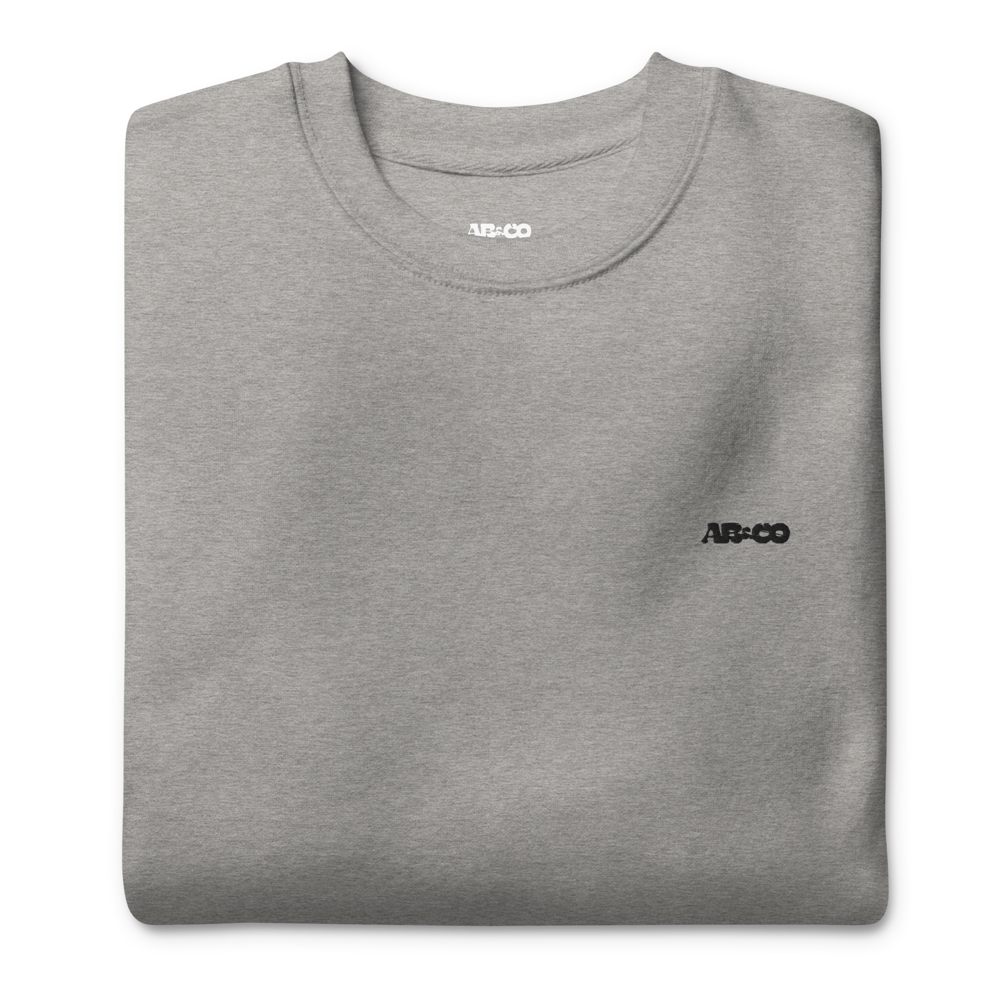 Grey embroidered hoodie with soft interior, structured fit, and minimal streetwear design.