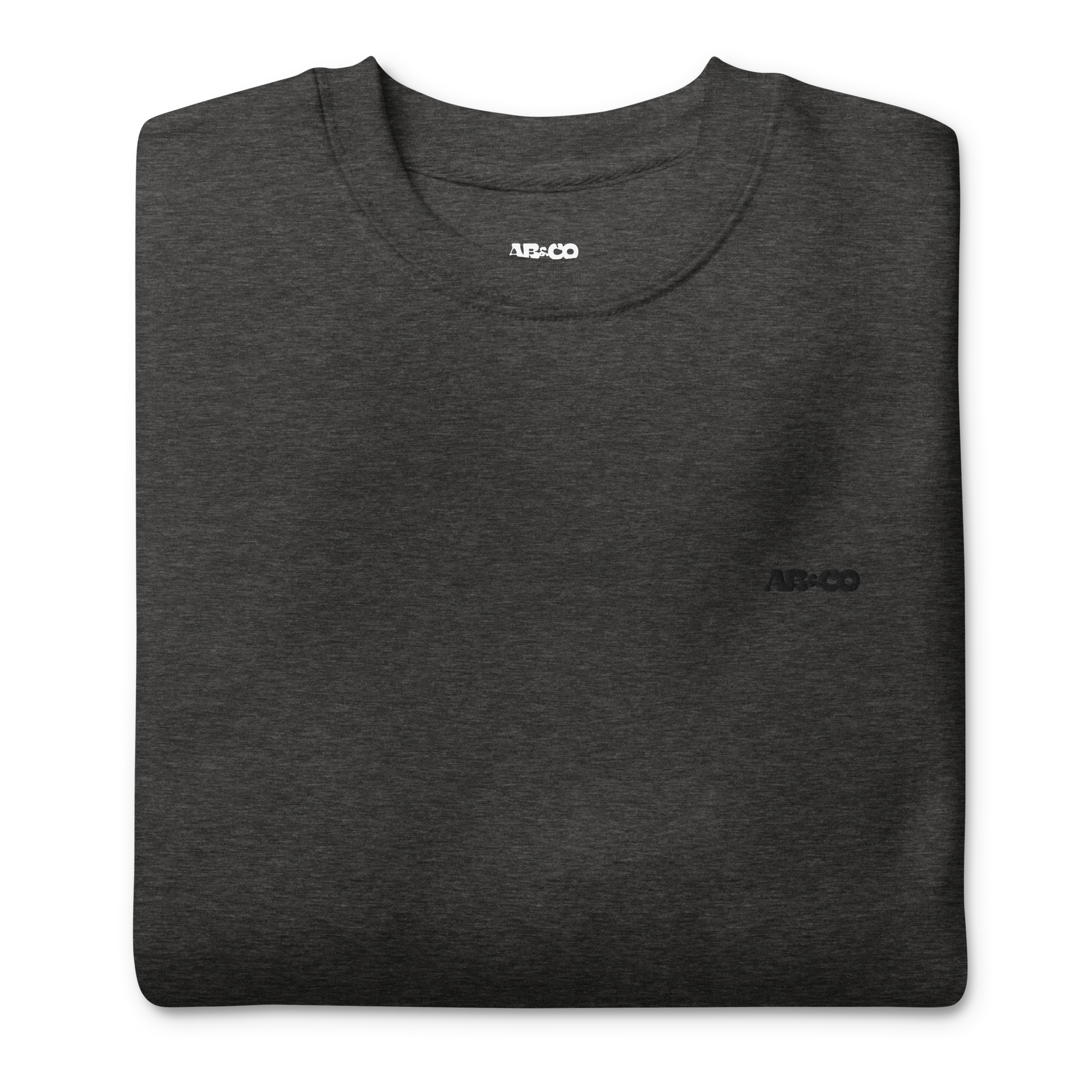 Charcoal embroidered hoodie with soft interior, structured fit, and minimal streetwear design.