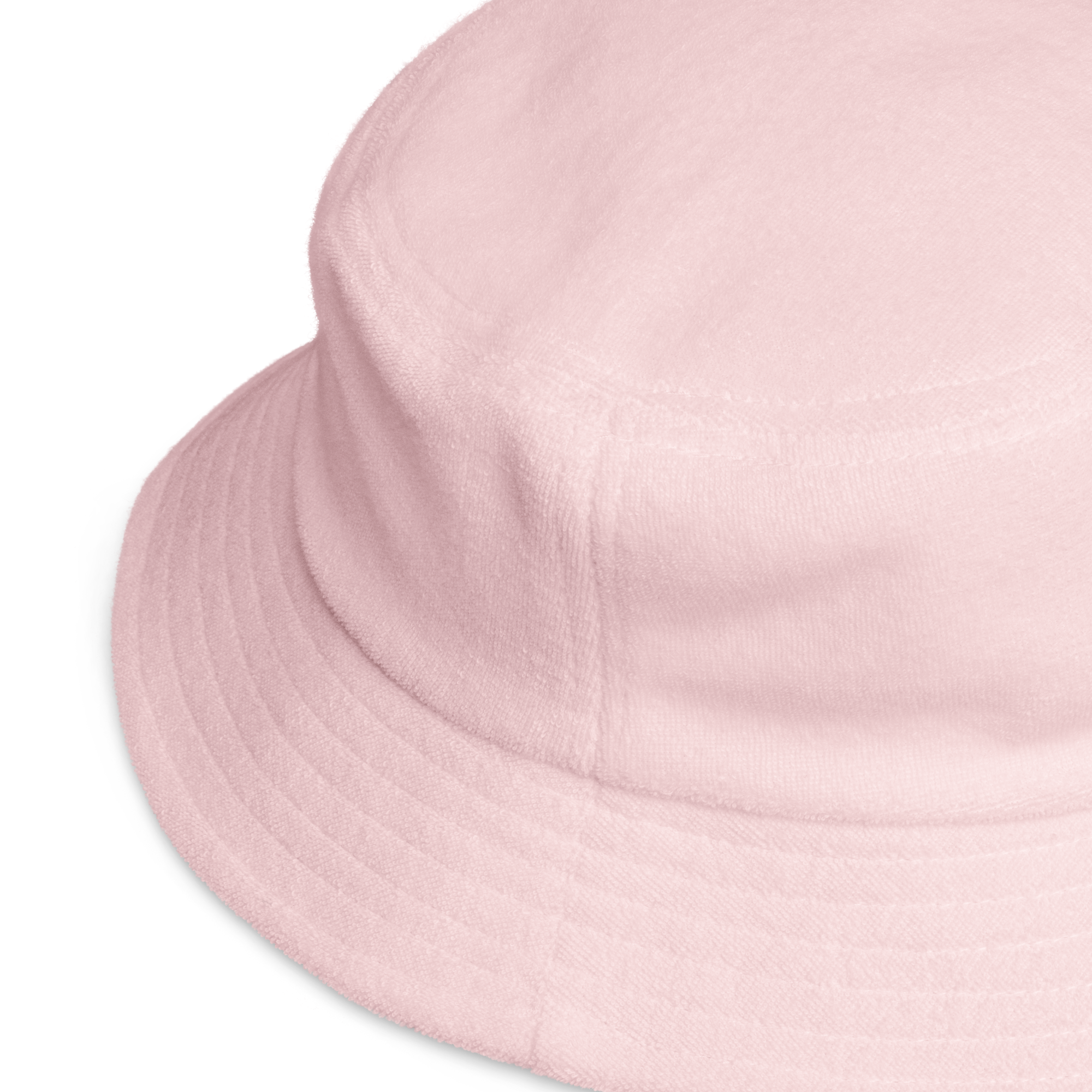 Unstructured bucket hat in Pink with embroidered logo, lightweight cotton, and relaxed streetwear fit.